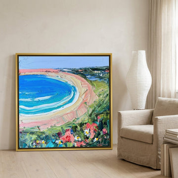 Canvas wall art with a gold leaf surround leaning against the wall in a warm Japandi home office