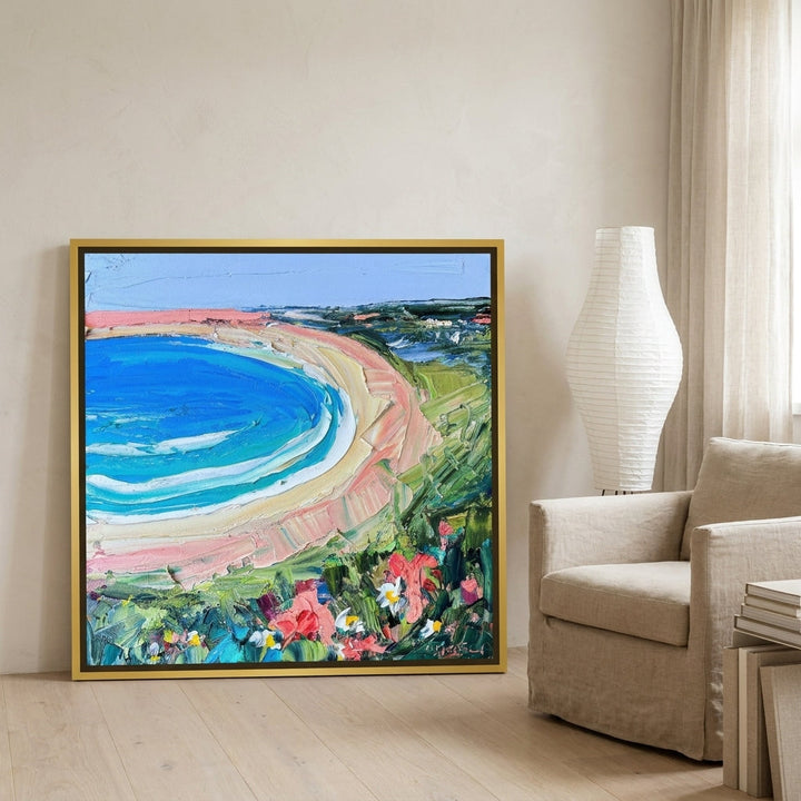 Canvas wall art with a gold leaf surround leaning against the wall in a warm Japandi home office