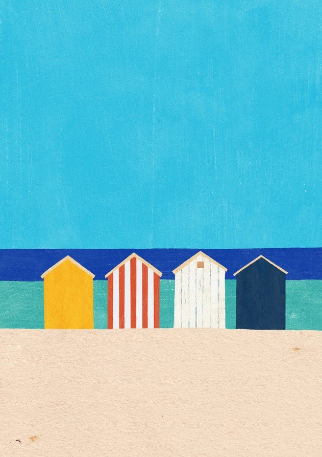 Four colorful beach huts on a sandy beach with a blue sky. framed