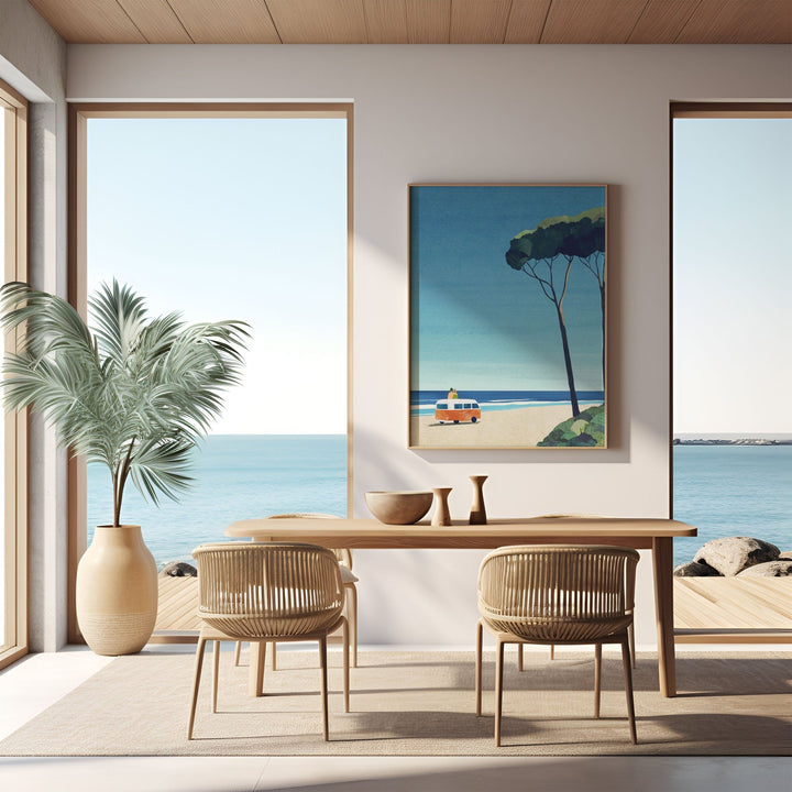Modern dining room with ocean view, wooden table, and chairs.
