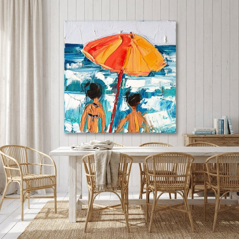 Stretched canvas wall art styled on the wall in a coastal dining room