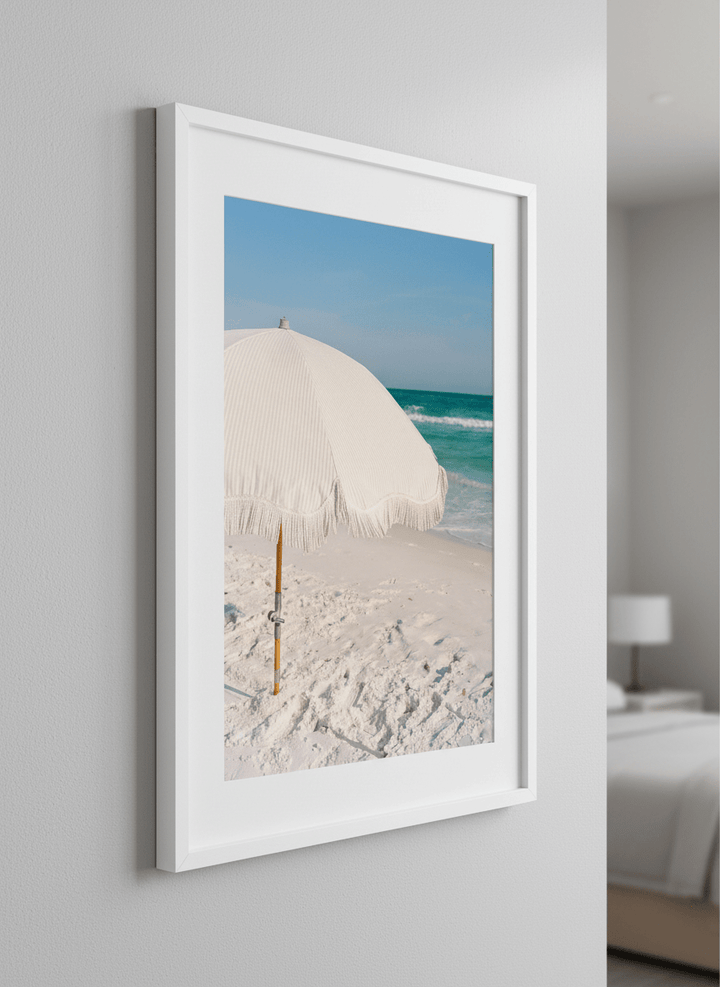 Minimalist artwork displayed in a calm, light-filled bedroom interior