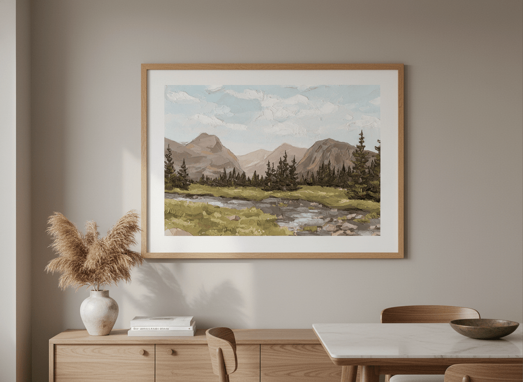 Wall art styled above a dining table in a contemporary home