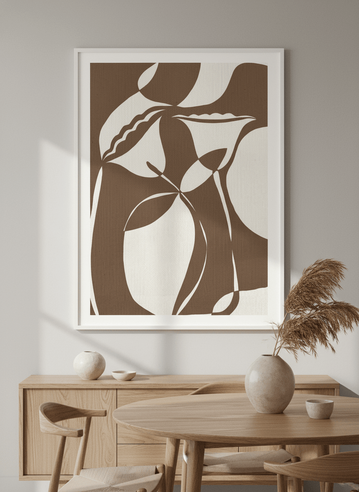 Wall art styled above a dining table in a contemporary home