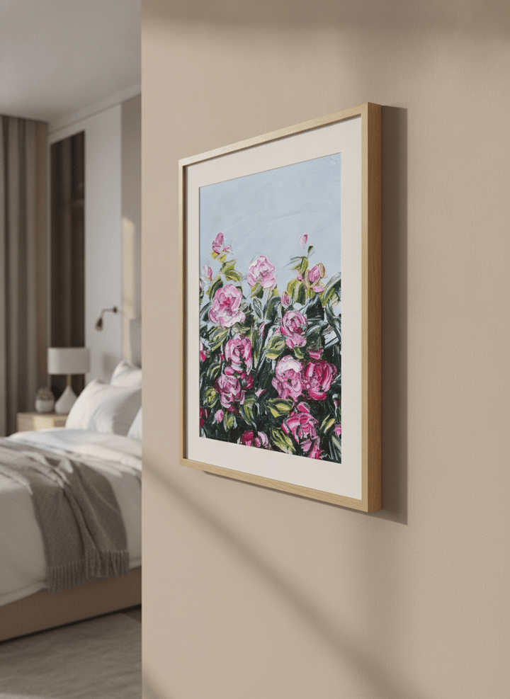 Minimalist artwork displayed in a calm, light-filled bedroom interior