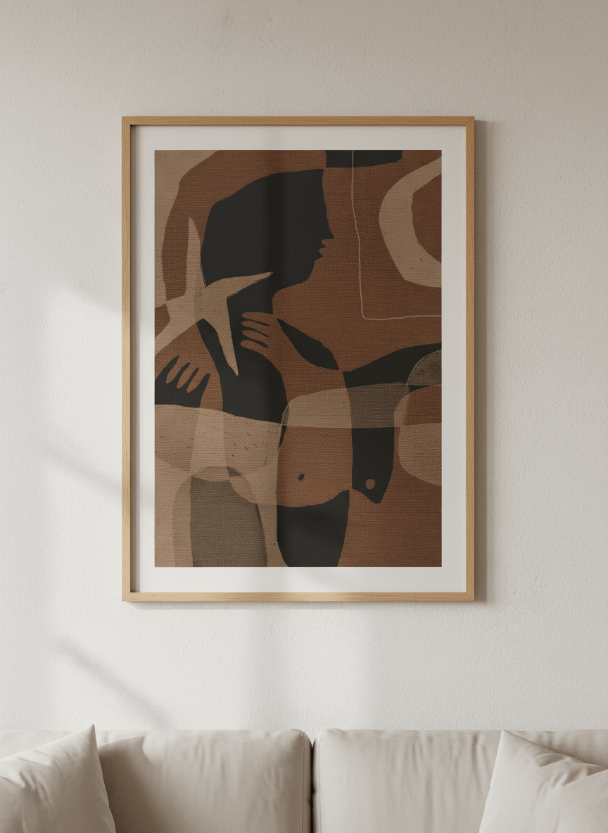 Modern wall art styled above a sofa in a neutral living room