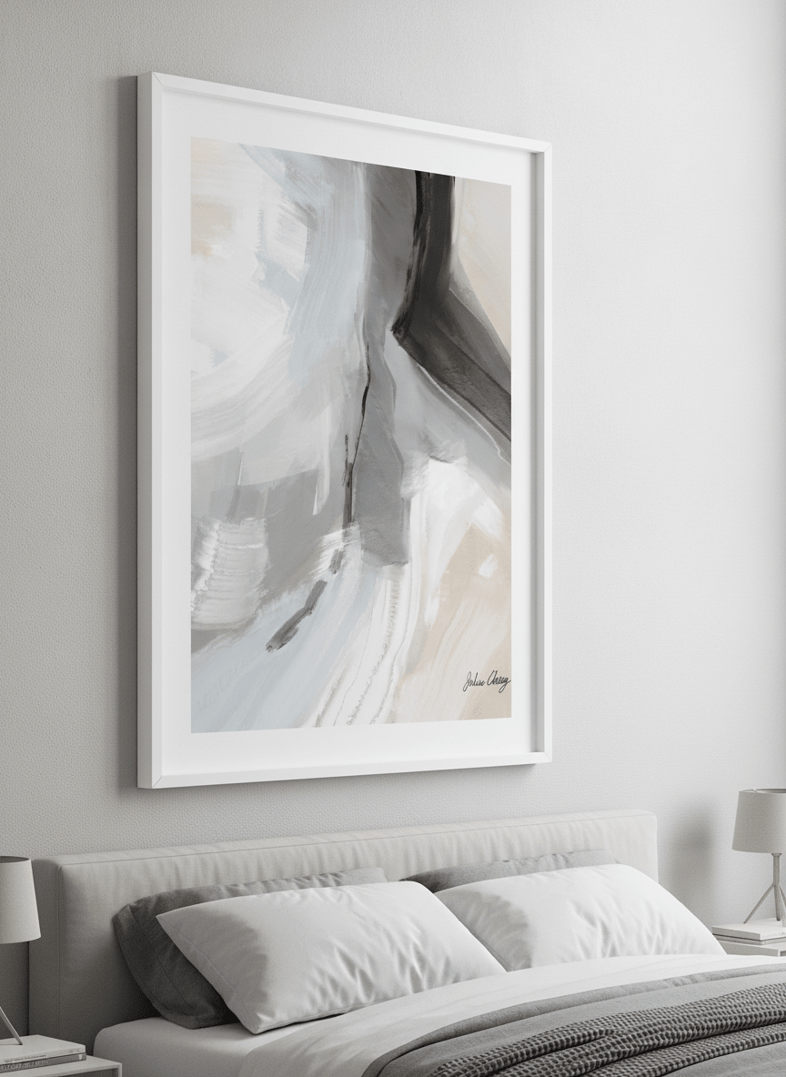 Minimalist artwork displayed in a calm, light-filled bedroom interior