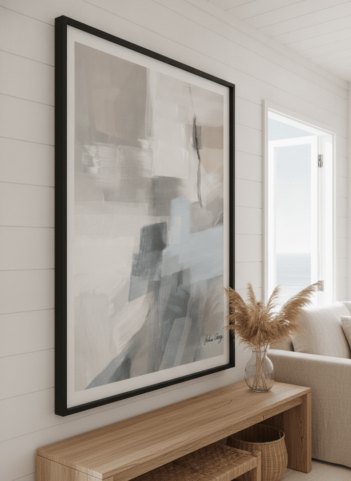 Neutral wall art displayed in a sunny coastal beach house