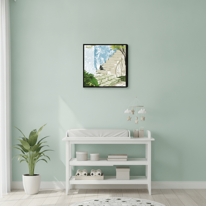 Canvas wall art with a black surround styled in a serene nursery