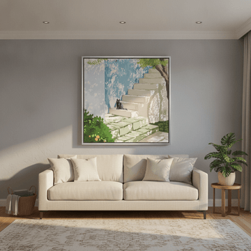 Oversized statement canvas wall art with a silver leaf surround styled in a neutral living room