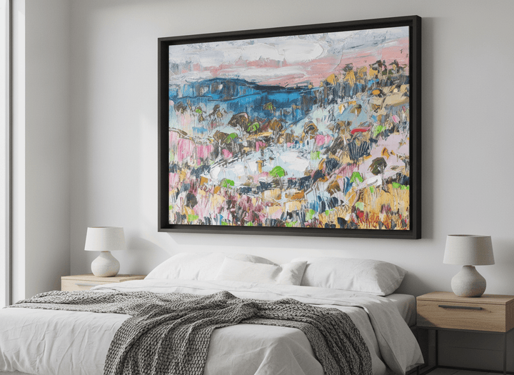 Minimalist artwork displayed in a calm, light-filled bedroom interior
