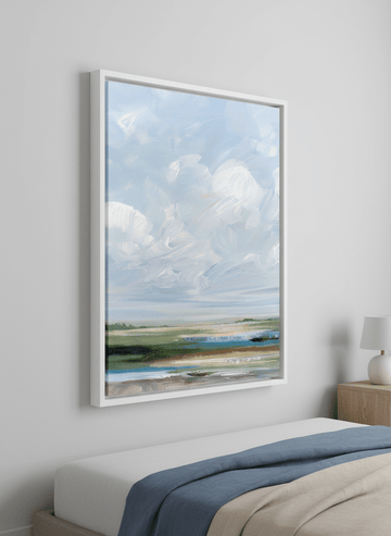 Minimalist artwork displayed in a calm, light-filled bedroom interior