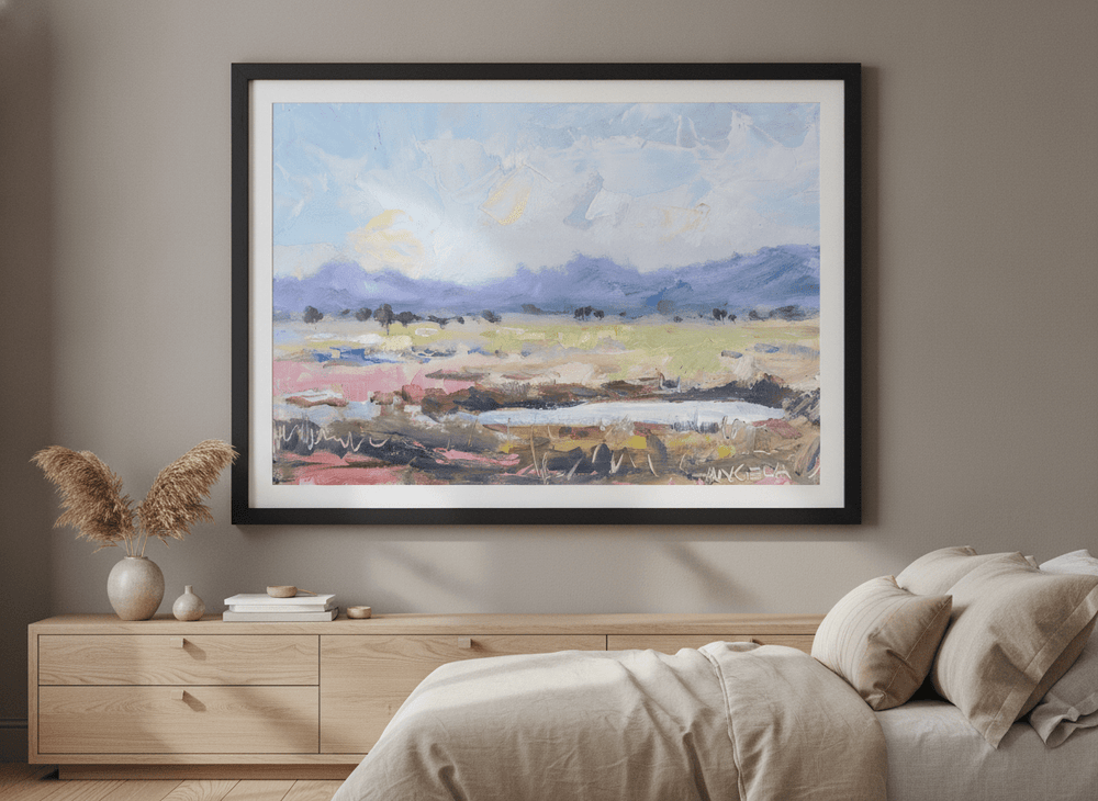 Minimalist artwork displayed in a calm, light-filled bedroom interior