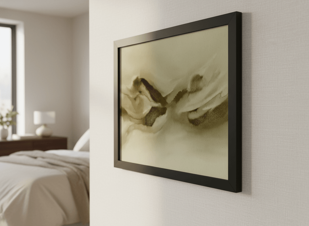 Minimalist artwork displayed in a calm, light-filled bedroom interior