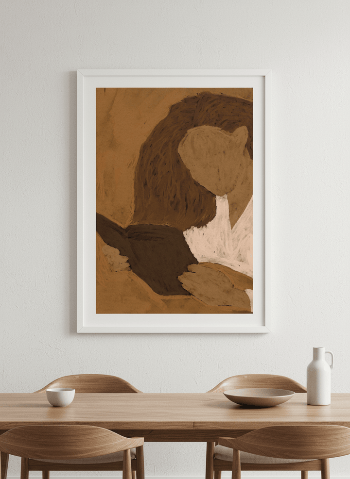 Wall art styled above a dining table in a contemporary home