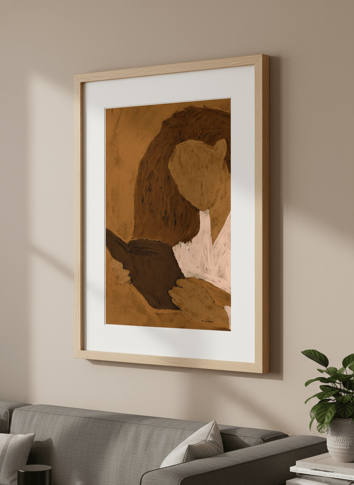 Modern wall art styled above a sofa in a neutral living room