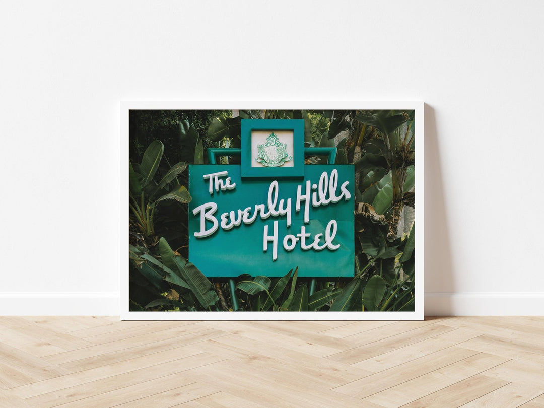 picture of The Beverly Hills Hotel sign with greenery in the background
