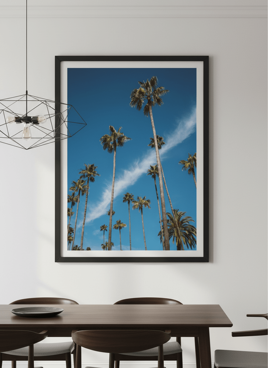Wall art styled above a dining table in a contemporary home