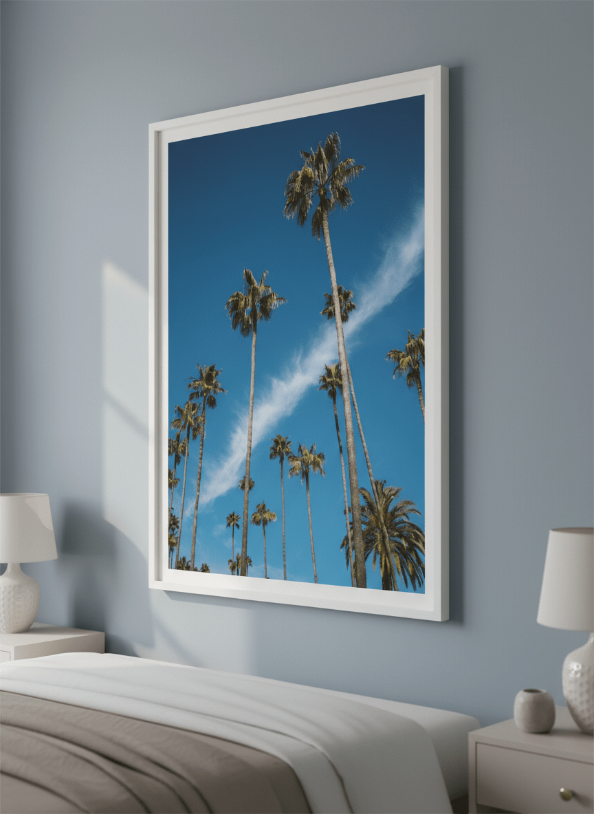 Minimalist artwork displayed in a calm, light-filled bedroom interior