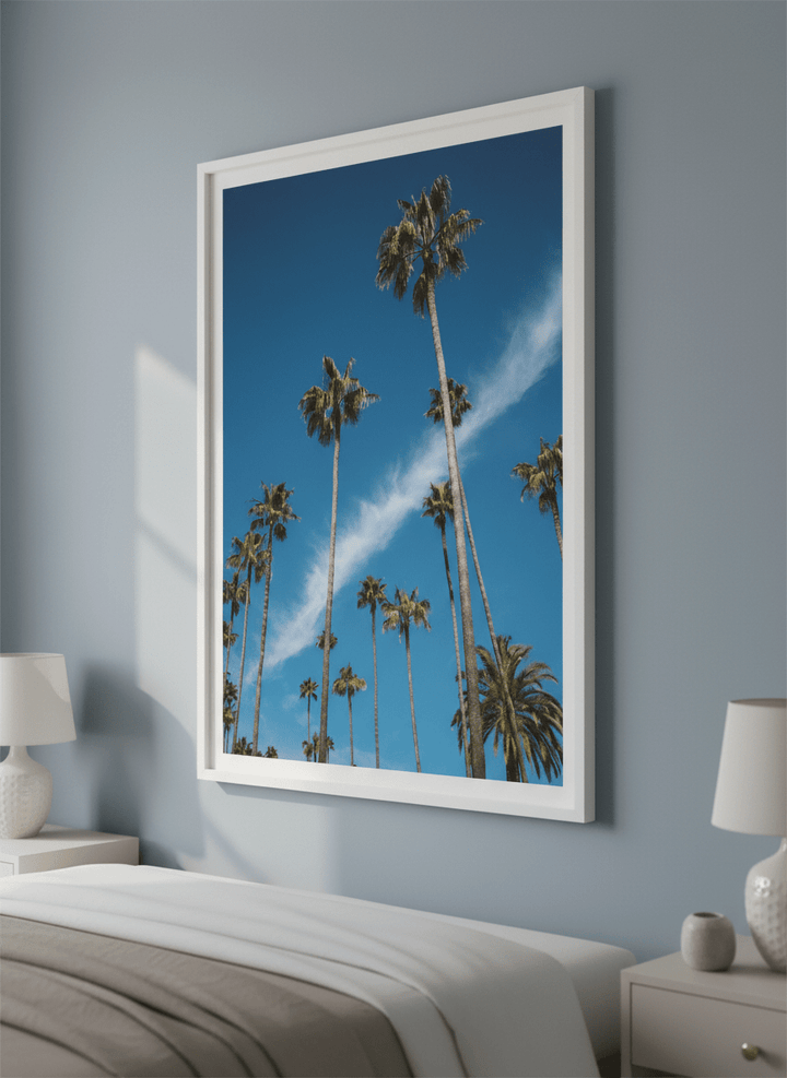 Minimalist artwork displayed in a calm, light-filled bedroom interior