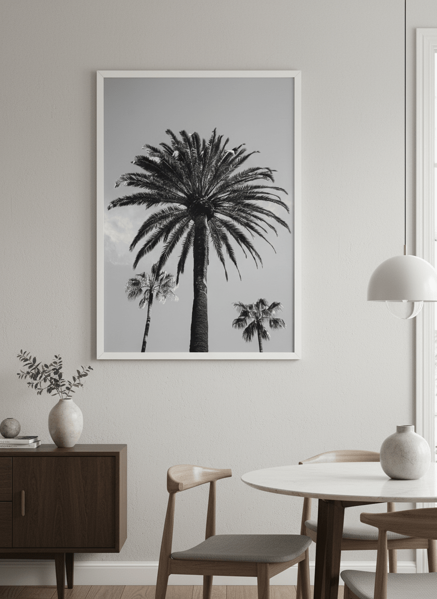 Wall art styled above a dining table in a contemporary home