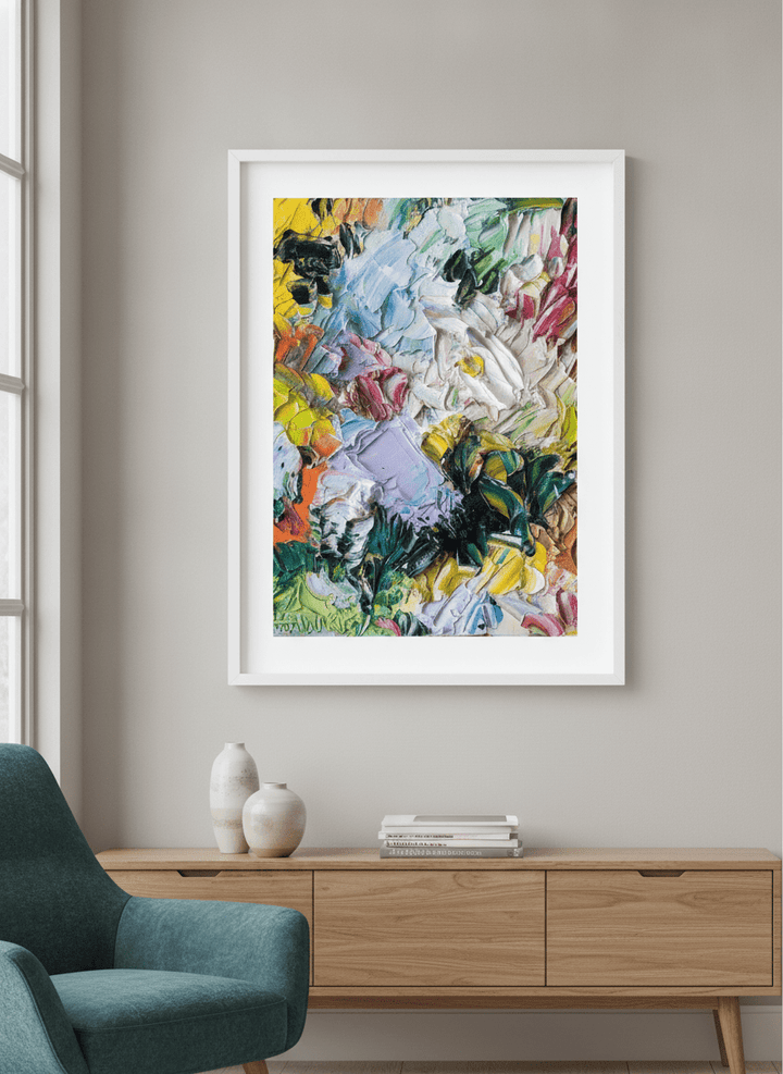 Modern wall art styled above a sofa in a neutral living room