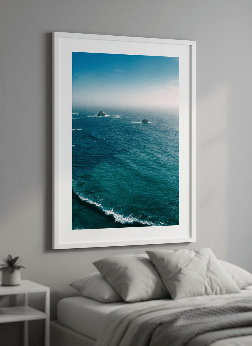 Minimalist artwork displayed in a calm, light-filled bedroom interior