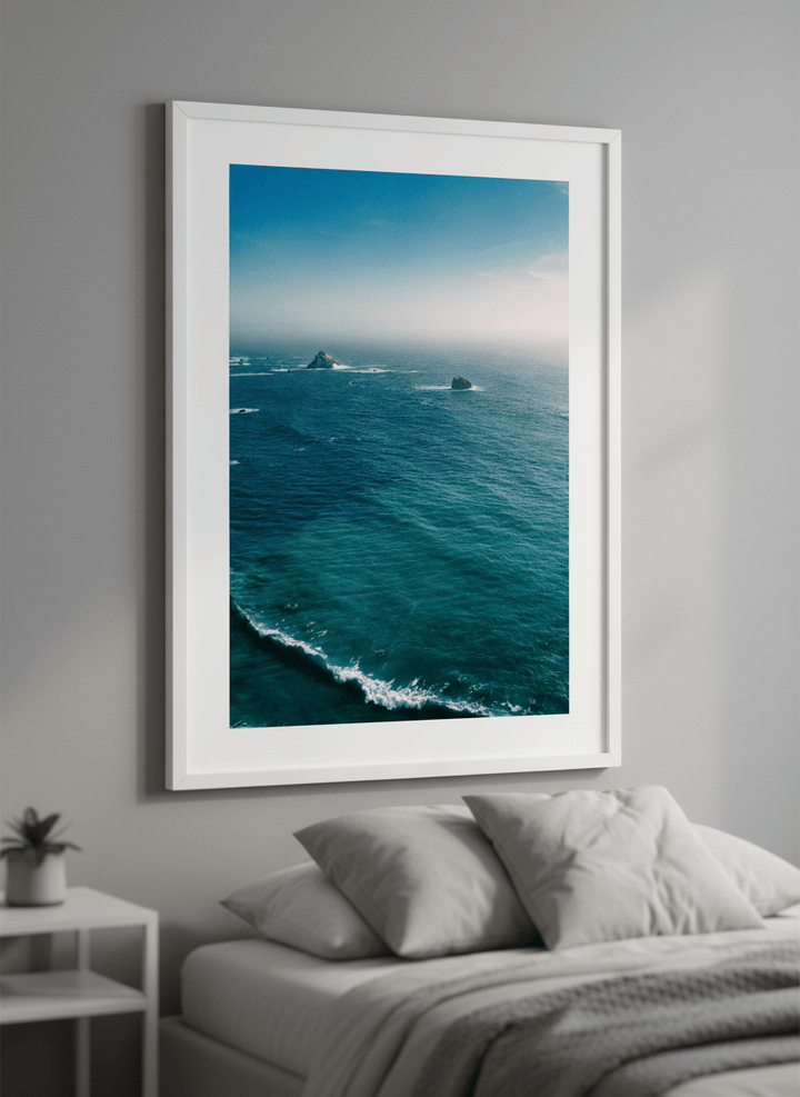 Minimalist artwork displayed in a calm, light-filled bedroom interior