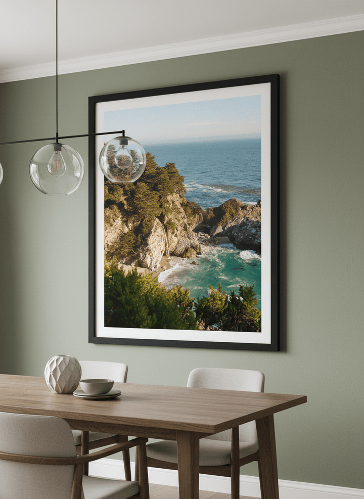 Wall art styled above a dining table in a contemporary home