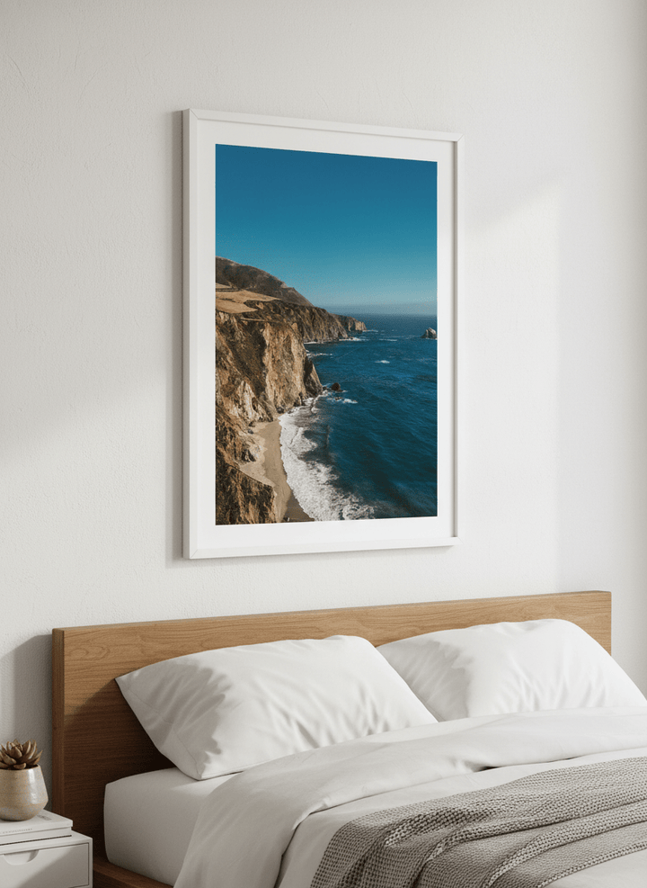 Minimalist artwork displayed in a calm, light-filled bedroom interior