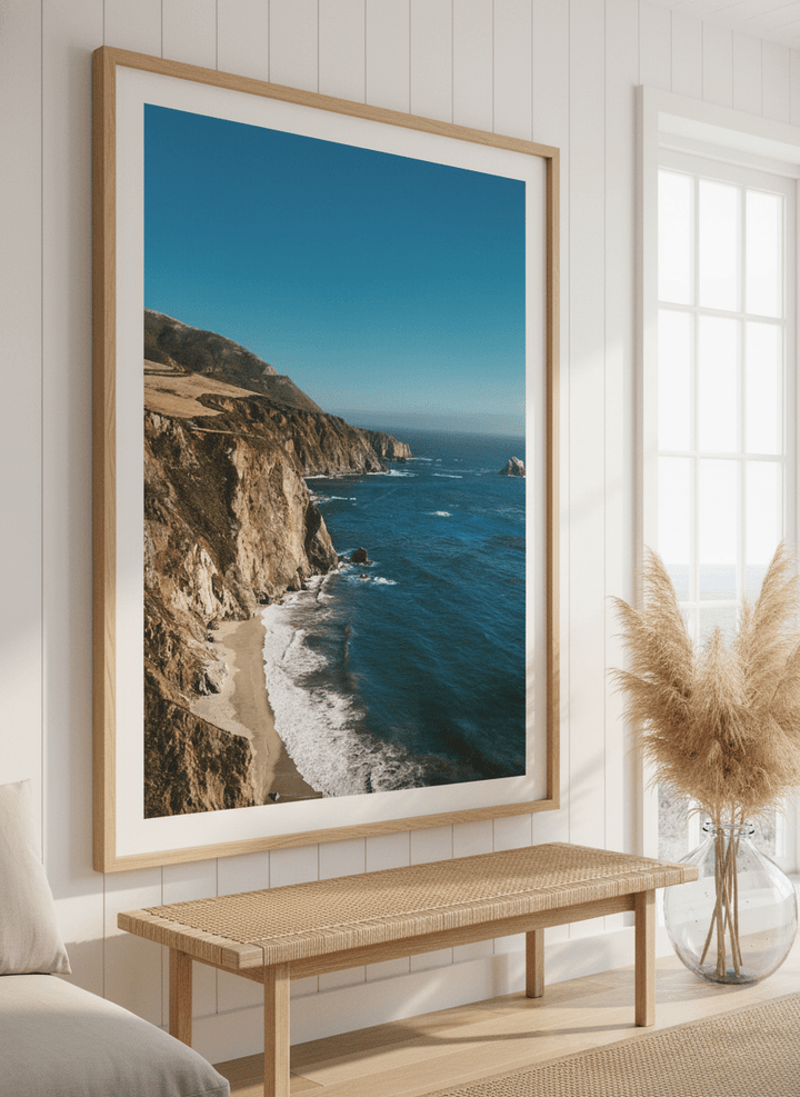Neutral wall art displayed in a sunny coastal beach house