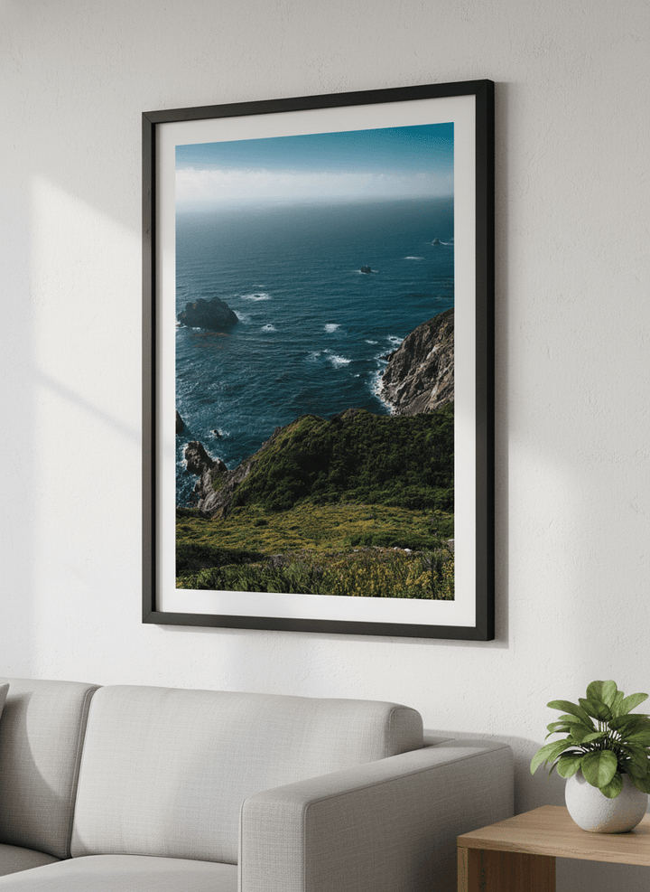 Modern wall art styled above a sofa in a neutral living room
