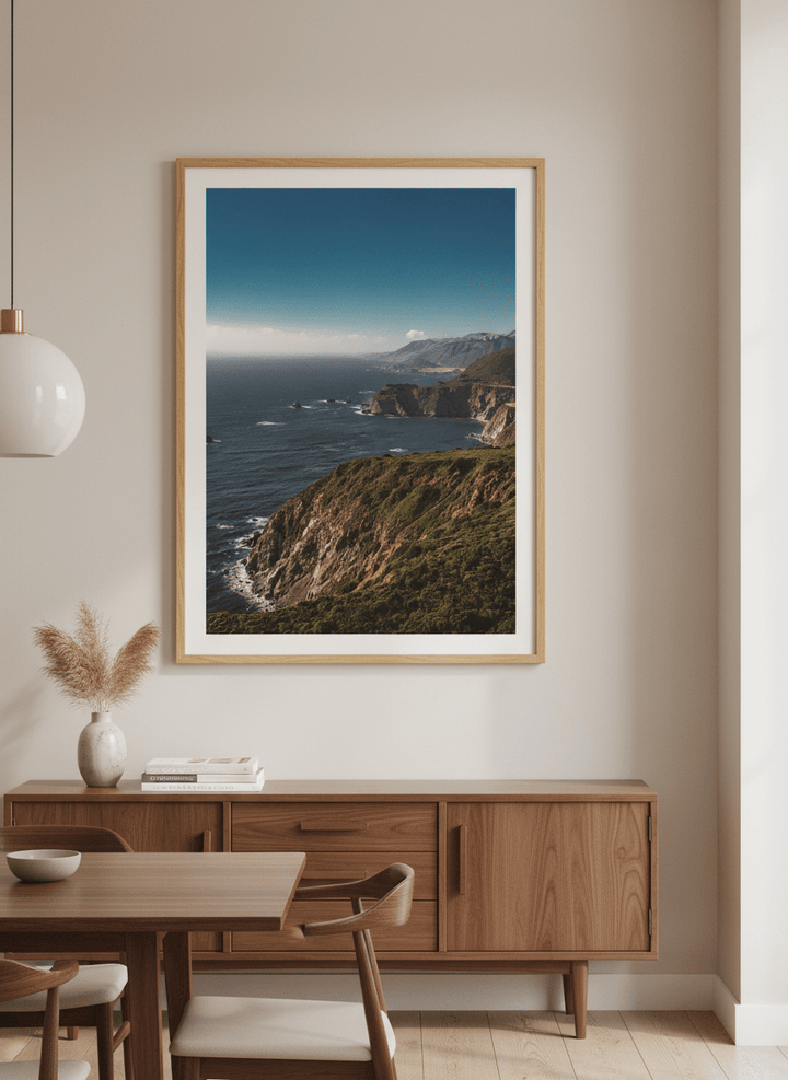 Wall art styled above a dining table in a contemporary home