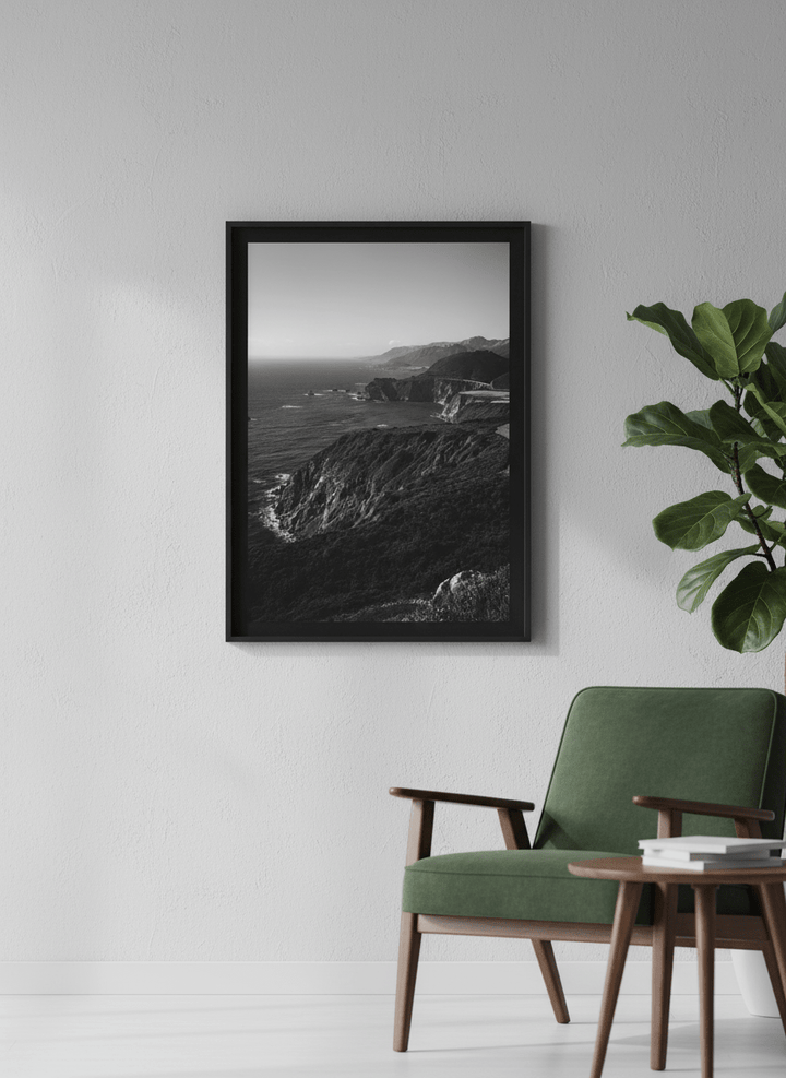 Modern wall art styled above a sofa in a neutral living room