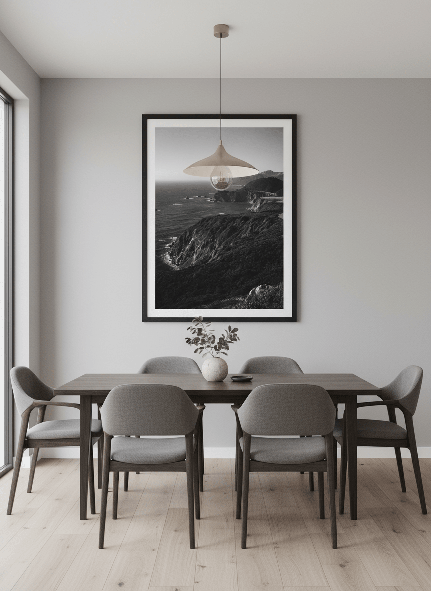 Wall art styled above a dining table in a contemporary home