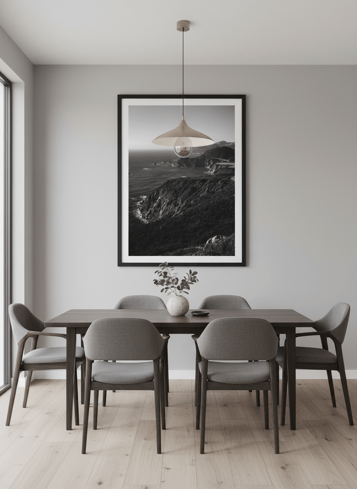 Wall art styled above a dining table in a contemporary home