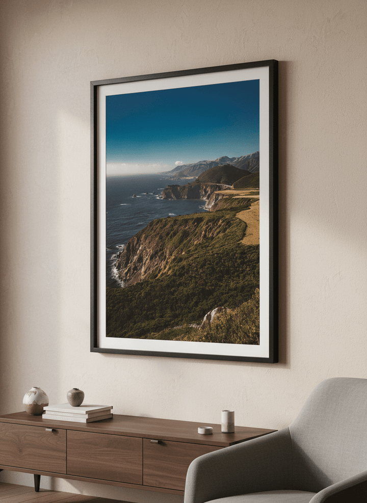 Modern wall art styled above a sofa in a neutral living room
