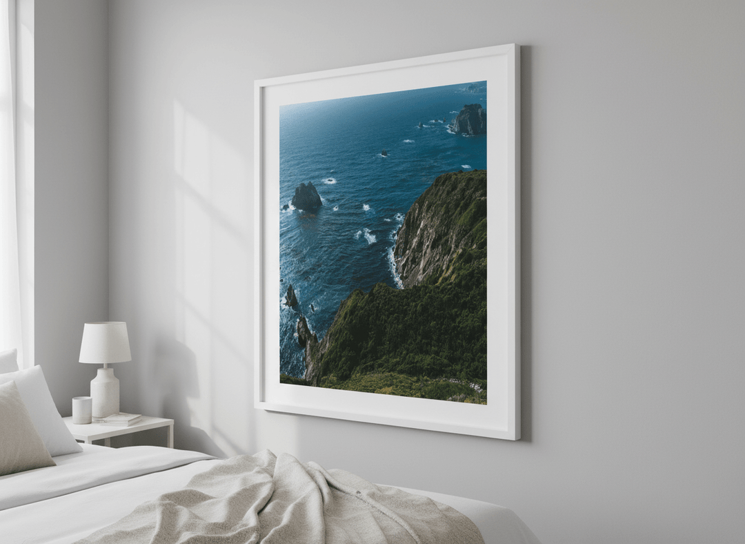 Minimalist artwork displayed in a calm, light-filled bedroom interior