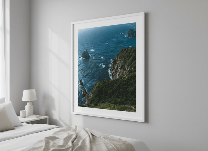 Minimalist artwork displayed in a calm, light-filled bedroom interior