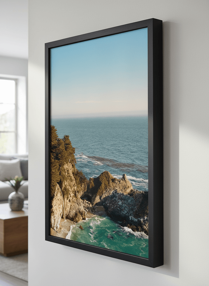 Modern wall art styled above a sofa in a neutral living room
