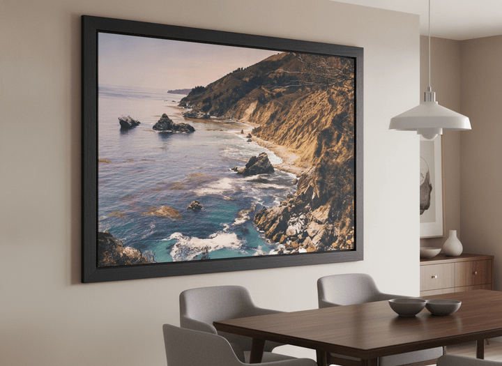 Wall art styled above a dining table in a contemporary home