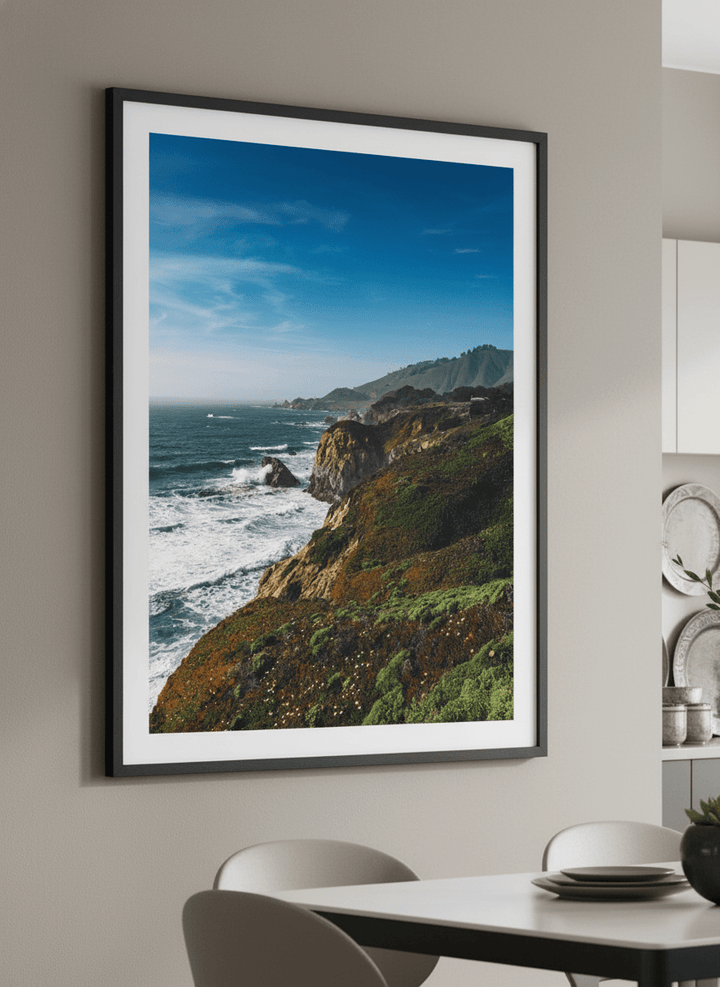 Wall art styled above a dining table in a contemporary home