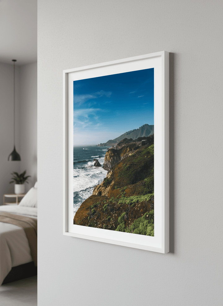Minimalist artwork displayed in a calm, light-filled bedroom interior