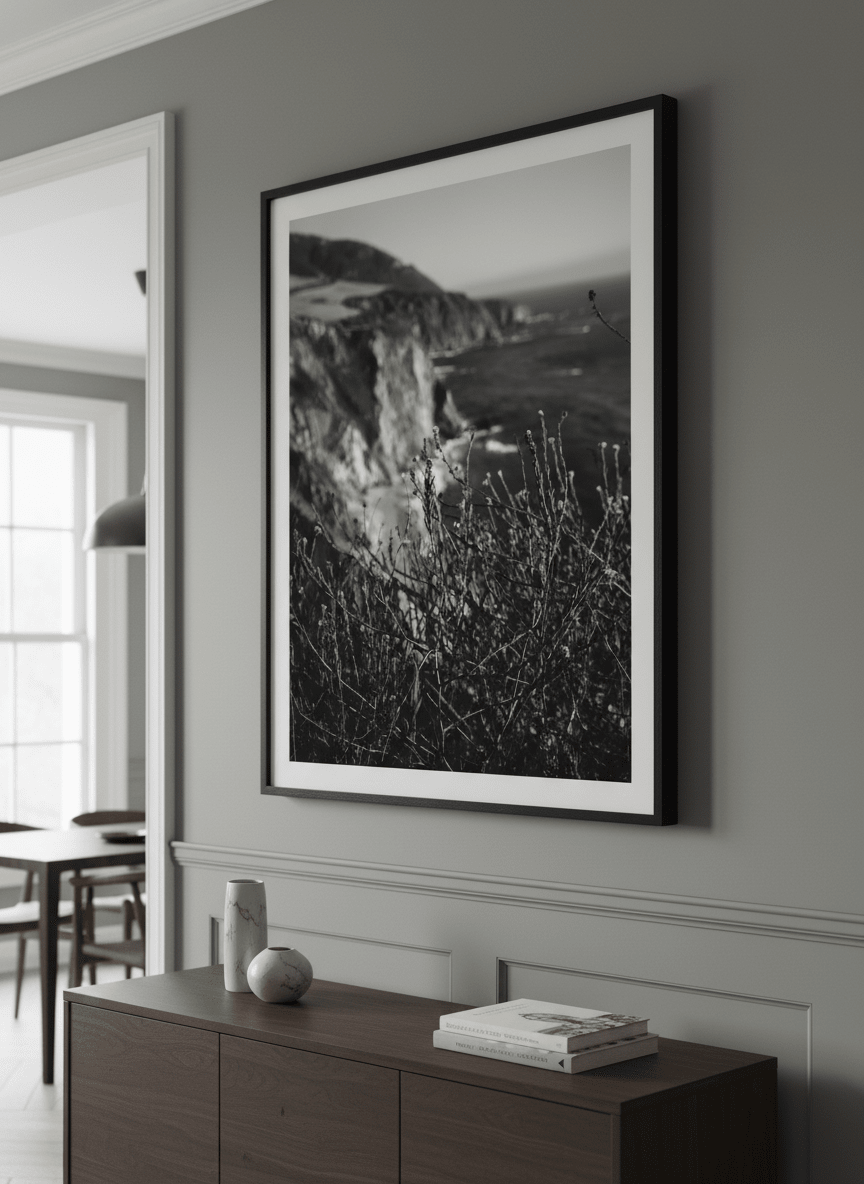 Wall art styled above a dining table in a contemporary home