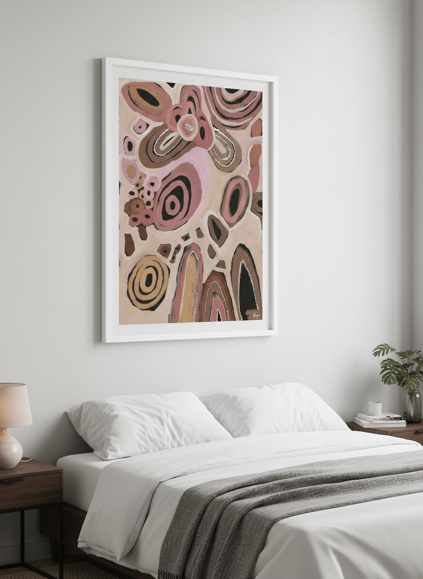 Minimalist artwork displayed in a calm, light-filled bedroom interior
