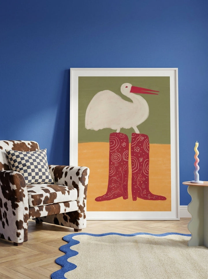 Modern wall art print leaning against the wall in a colourful eclectic dining room
