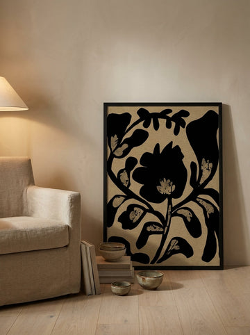 Modern wall art print leaning against the wall in a warm Japandi bedroom