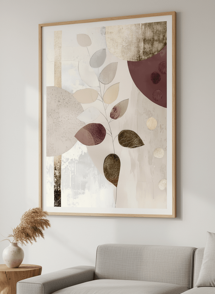 Modern wall art styled above a sofa in a neutral living room