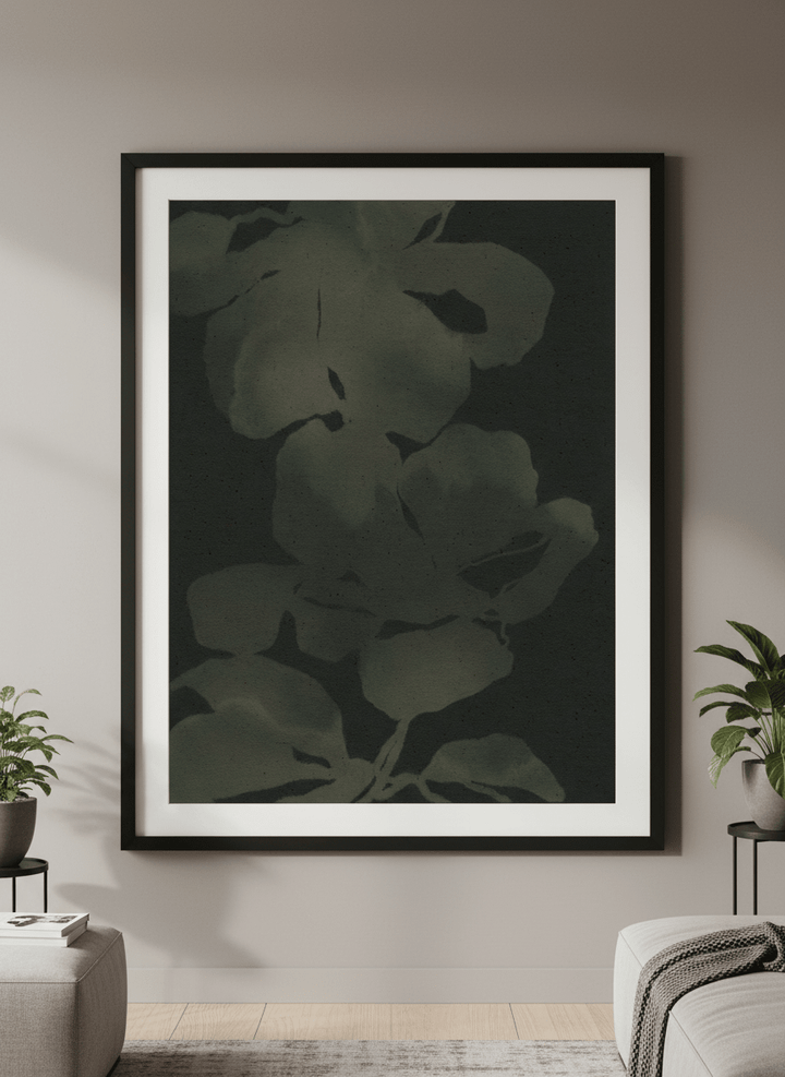 Modern wall art styled above a sofa in a neutral living room