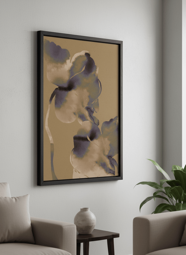 Modern wall art styled above a sofa in a neutral living room